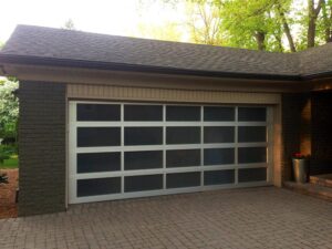 A decorative full-view garage door on a home.