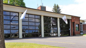 large commercial garage doors that feature see-through glass